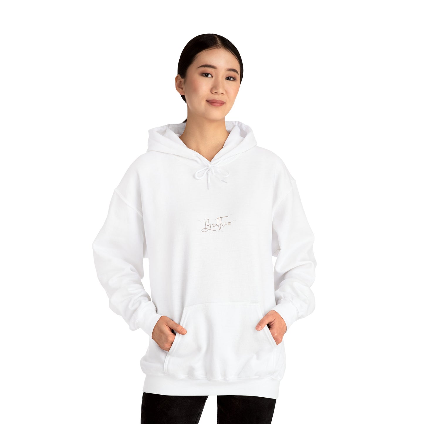 Woman wearing white hoodie with 'Breathe' on chest - front view