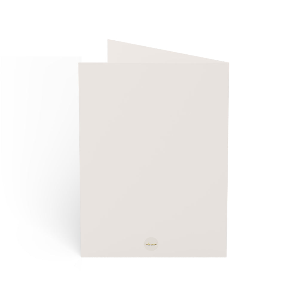 Christmas holiday card adorned with Eku ume Hope | Art logo on the back | eKuumeArt.