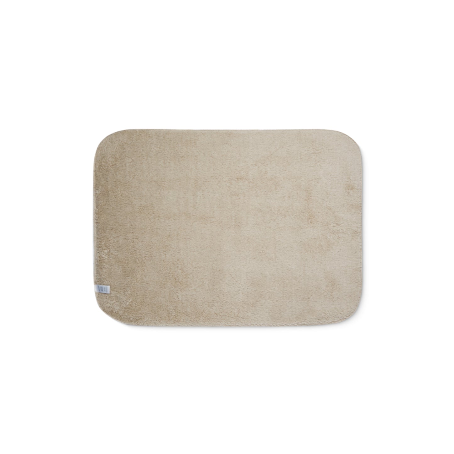 Beige sherpa side of two-coloured blanket.