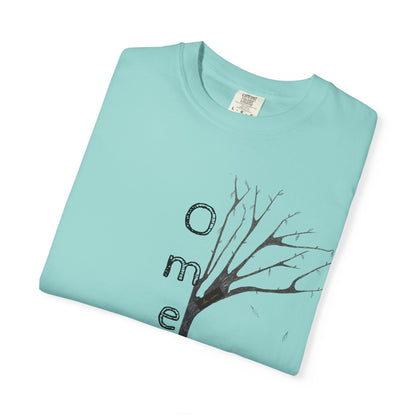 Chalky Mint tshirt, folded displaying hand-drawn tree with 'Omemma' text and eKuumeArt logo on chest.