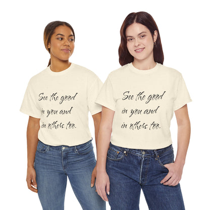 Two women wearing natural/beige heavy cotton t-shirts with ‘See the good…’ motivational quote text.