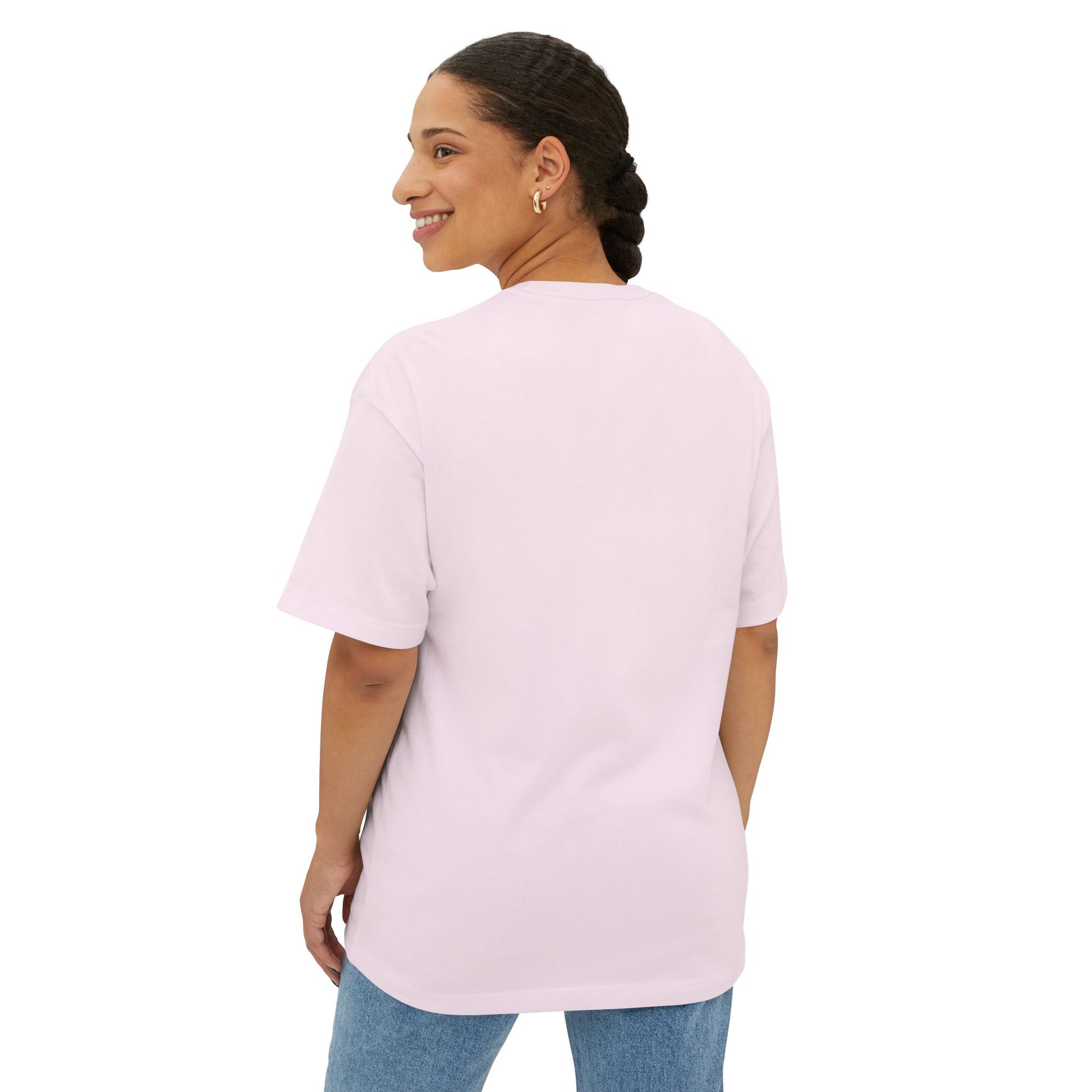 Woman wearing soft pink tshirt – back view.