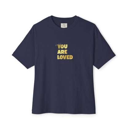 Navy t-shirt adorned with 'You Are Loved' text in gold and eKuumeArt neck label.