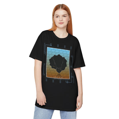 Woman wearing black long body urban tee adorned with Afro Nature art, inspirational text, eKuumeArt logo and geometric design.