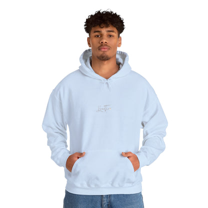 Man wearing light blue hoodie with 'Breathe' on chest – front view.