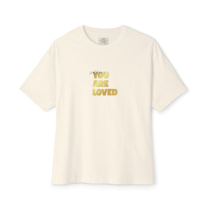 Natural t-shirt adorned with 'You Are Loved' text in gold and eKuumeArt neck label.