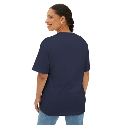 Woman wearing navy tshirt – back view.