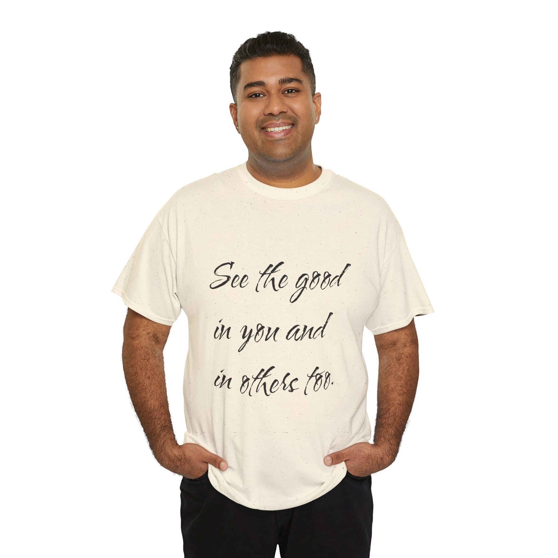 Man wearing a natural/beige heavy cotton t-shirt with ‘See the good…’ motivational quote text.