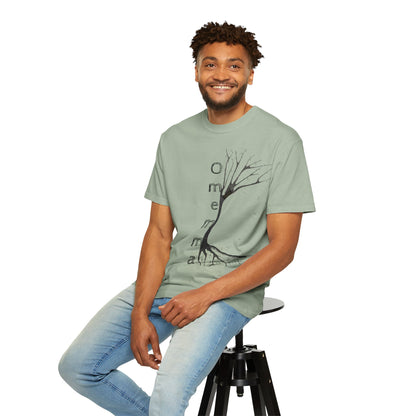 Man seated on stool wearing bay tshirt with hand-drawn tree, 'Omemma' text and eKuumeArt logo on torso.
