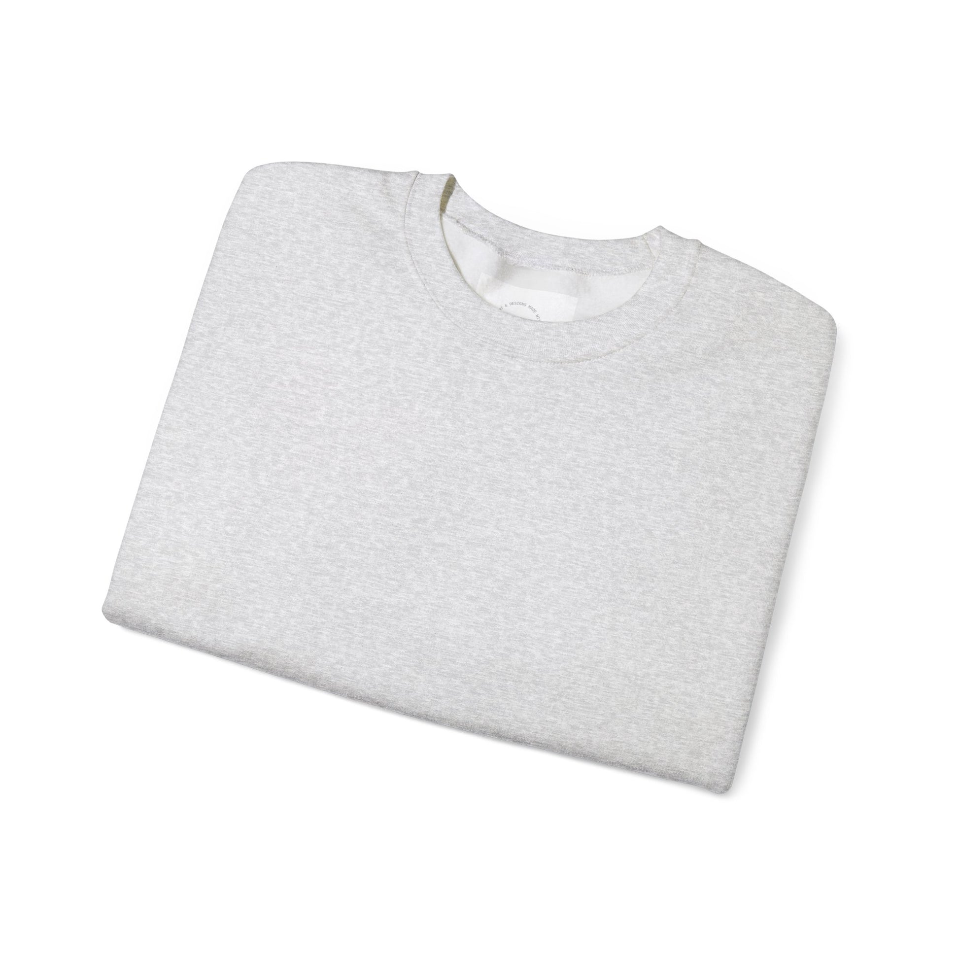 Ash crewneck sweatshirt, folded with a peek of eKuumeArt label