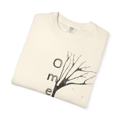 Ivory tshirt, folded displaying hand-drawn tree with 'Omemma' text and eKuumeArt logo on chest.