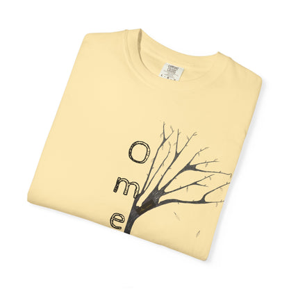 Banana tshirt, folded displaying hand-drawn tree with 'Omemma' text and eKuumeArt logo on chest.