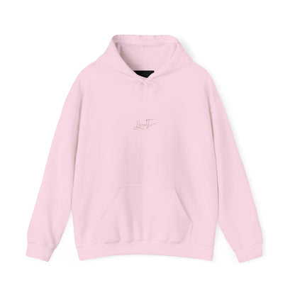 Light Pink hoodie adorned with 'Breathe' handwritten text on chest.