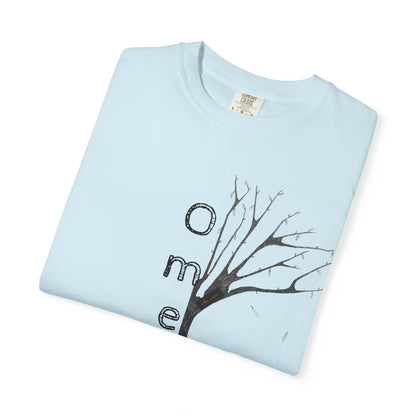 Chambray tshirt, folded displaying hand-drawn tree with 'Omemma' text and eKuumeArt logo on chest.