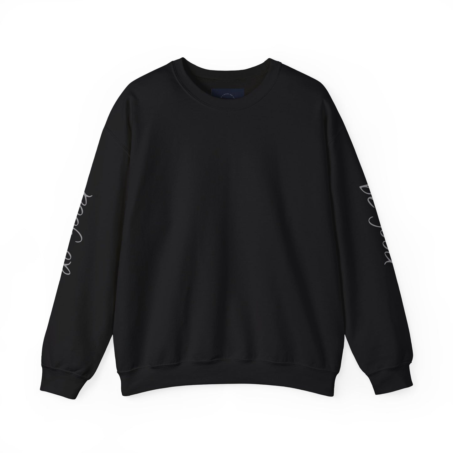 Black crewneck sweatshirt with "be good, do good" text on sleeves