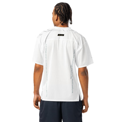 Man wearing white mesh football jersey adorned with lined leaves across shoulder area, eKuumeArt logo and Psalm 27:1 and 14 writing on back sides – back view, showing side slit.