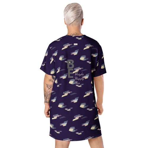 Woman wearing purple stretchy t-shirt dress with 'Be bright, happy, you' inspirational text on it – back view | eKuumeArt.
