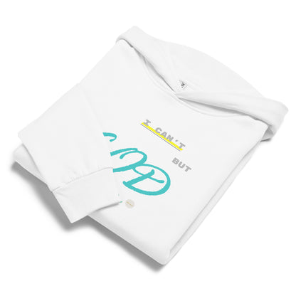 White hoodie, folded displaying 'I can't but God can' text and eKuumeArt logo on chest – one sleeve fold covering part of text.