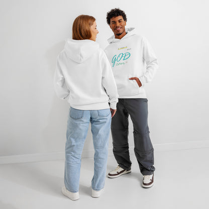 Man and woman wearing white hoodies with 'I can't but God can' text – back and front views.