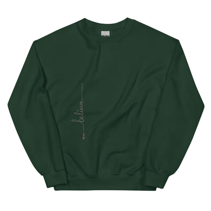 Forest Green sweater adorned with 'Believe' handwritten text and eKuumeArt logo on torso.