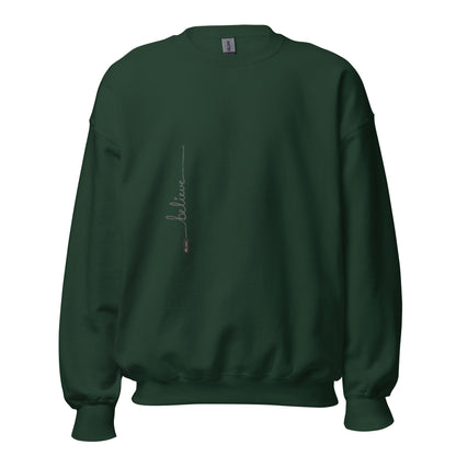 Forest Green sweater adorned with 'Believe' handwritten text and eKuumeArt logo on torso.