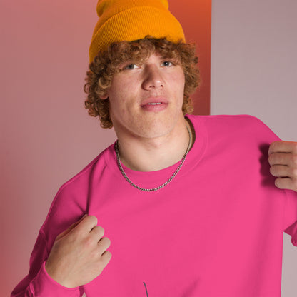 Man wearing an orange beanie and heliconia pink sweater with glimpse of 'Believe' handwritten text line – closeup view, featuring a pink and white room setting.