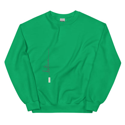 Irish Green sweater adorned with 'Believe' handwritten text and eKuumeArt logo on torso.