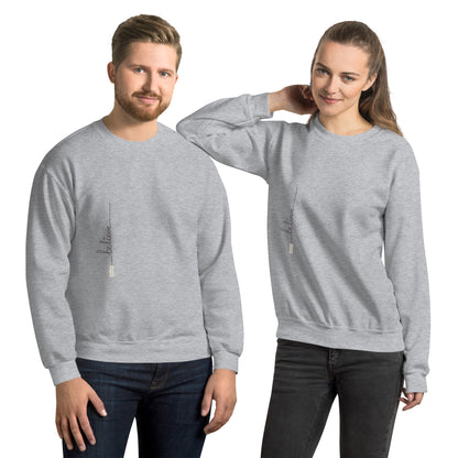 Man and woman wearing sport grey sweaters with 'Believe' handwritten text and eKuumeArt logo on torso – front view.