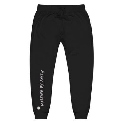 Black sweatpants adorned with 'Walking by faith' text and eKuumeArt logo on front right leg.