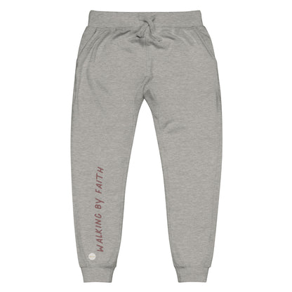 Carbon grey sweatpants adorned with 'Walking by faith' text and eKuumeArt logo on front right leg.