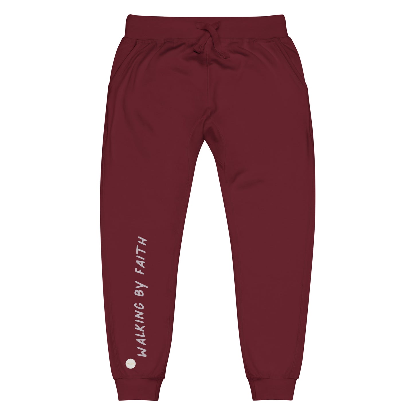 Maroon sweatpants adorned with 'Walking by faith' text and eKuumeArt logo on front right leg.