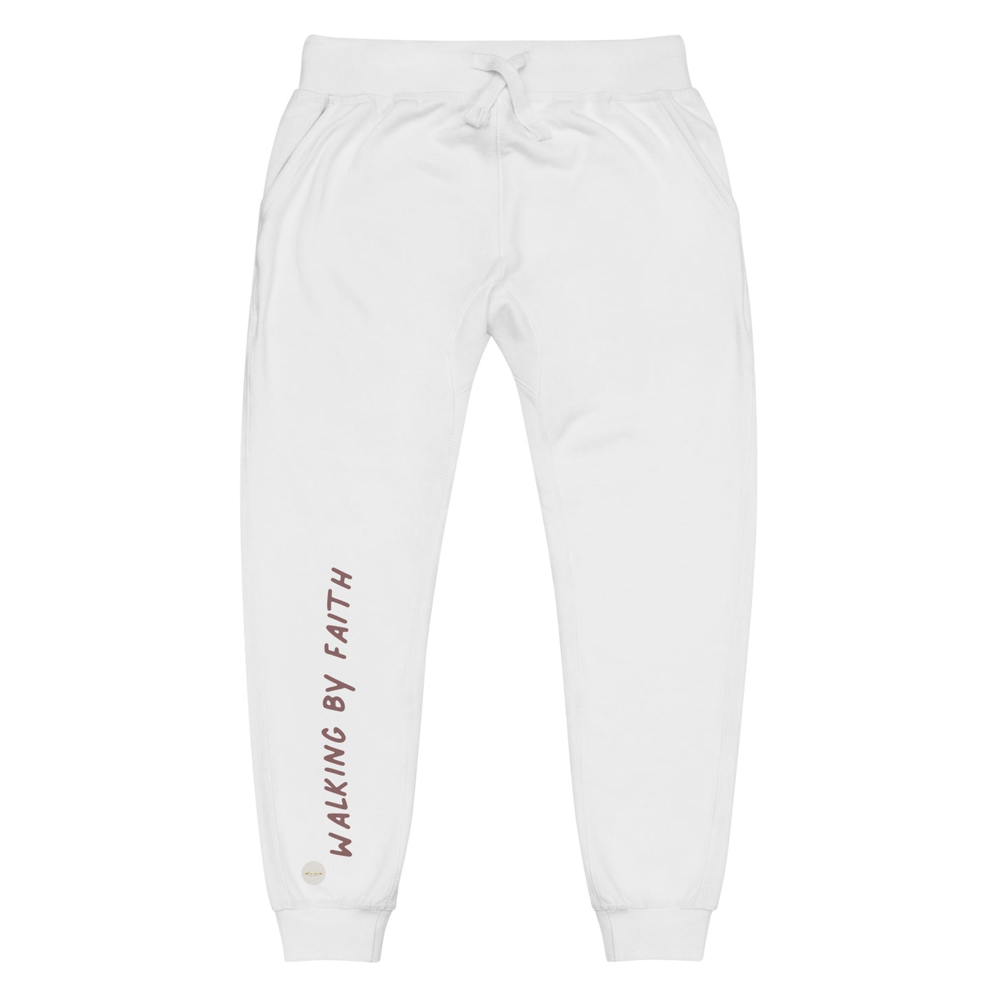 White sweatpants adorned with 'Walking by faith' text and eKuumeArt logo on front right leg.