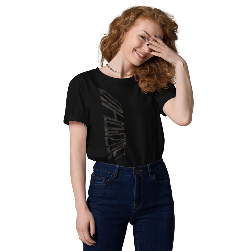 Woman wearing black organic cotton t-shirt with hand-drawn 'Strength' text | eKuumeArt.