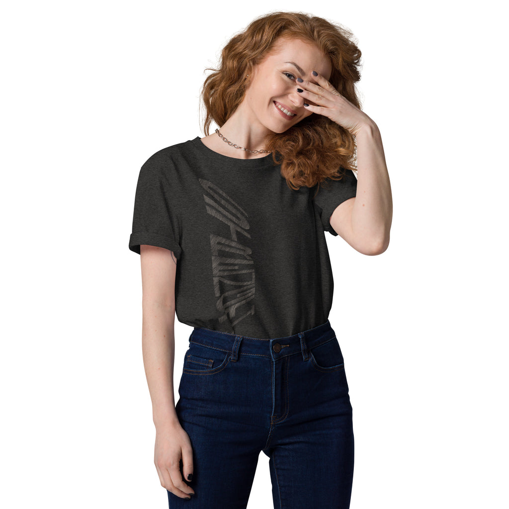 Woman wearing dark heather grey organic cotton t-shirt with hand-drawn 'Strength' text | eKuumeArt.