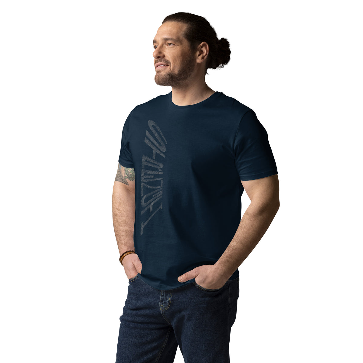 Guy wearing French navy organic cotton t-shirt with hand-drawn 'Strength' text – angled view | eKuumeArt.