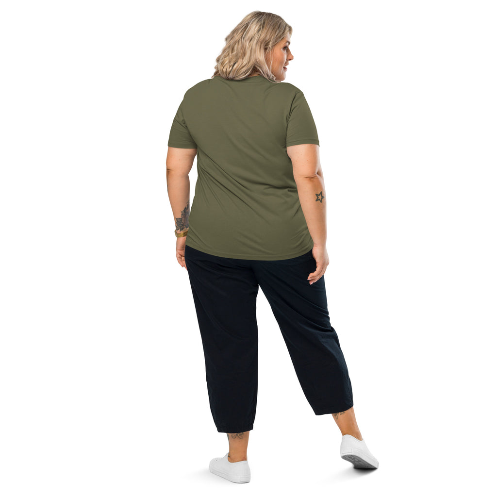 Woman wearing khaki green organic cotton t-shirt, black trousers and white sneakers – back view | eKuumeArt.