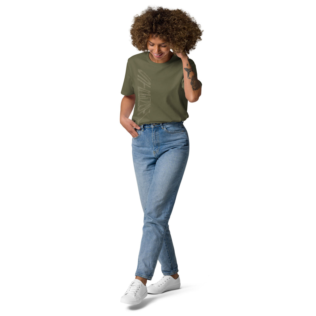 Lady wearing khaki green organic cotton t-shirt with hand-drawn 'Strength' text and blue jeans | eKuumeArt.