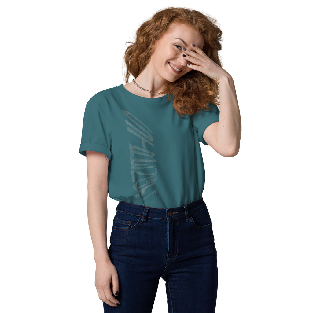 Woman wearing stargazer blue organic cotton t-shirt with hand-drawn 'Strength' text | eKuumeArt.