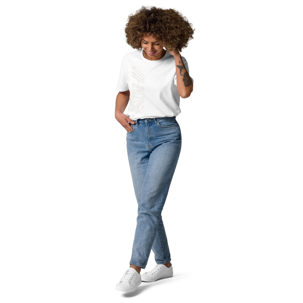 Lady wearing white organic cotton t-shirt with hand-drawn 'Strength' text and blue jeans | eKuumeArt.